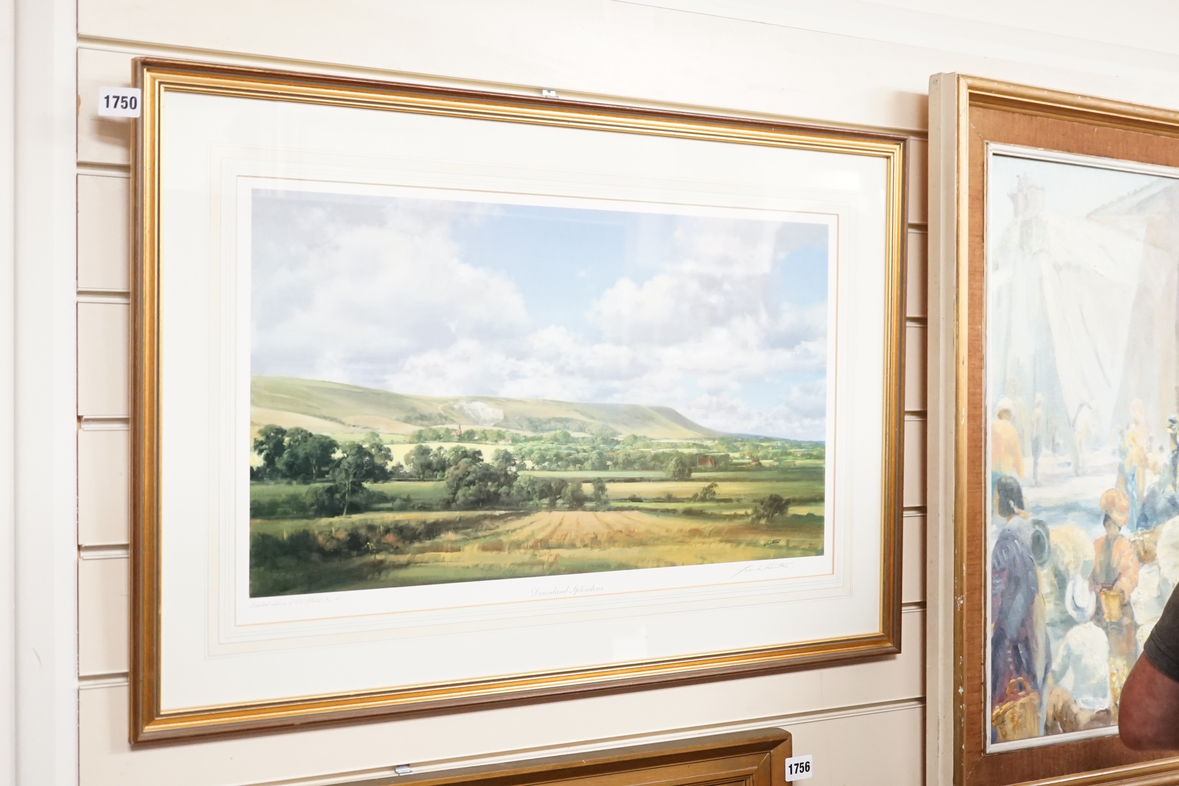 Frank Wootton (1911-1998), two limited edition colour prints, 'Under the Downs' and 'Downland Splendour', signed in pencil, limited edition 47/850 and 13/850, largest 35 x 60cm. Condition - good